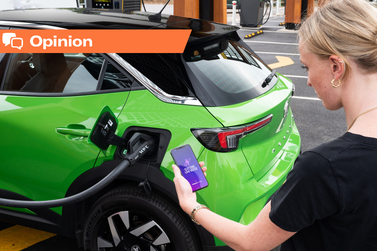 Person plugging in and charging a modern electric vehicle, showing the everyday convenience and lower cost of electricity vs gas in real-world ownership after many miles