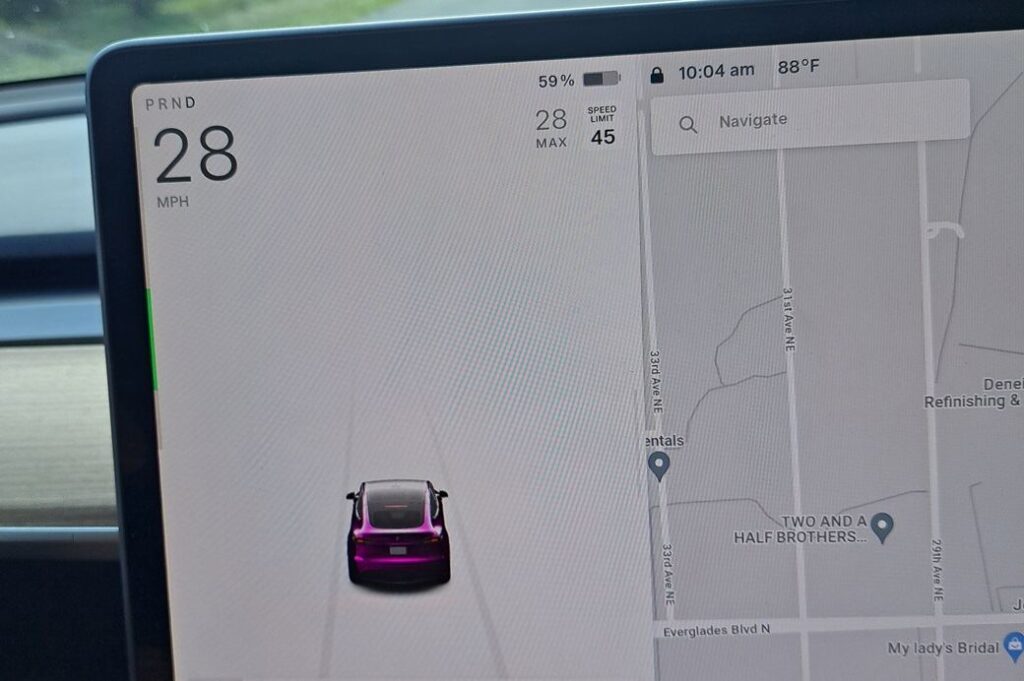 Electric vehicle dashboard showing battery charge level around 60%, everyday driving scene for managing charge to extend EV battery life